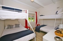 The bunk room is just perfect for the kids to hang out, offering two double beds, and two single beds, sleeping up to six.